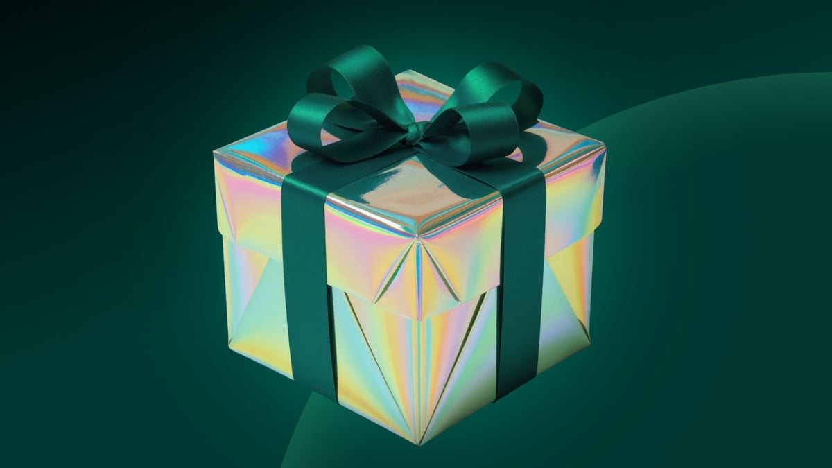 Ilustración en 3D de una caja decorada con un lazo verde, mostrado como un regalo relacionado con los bonos de Tiradas Extra en Paf Slots Online.
